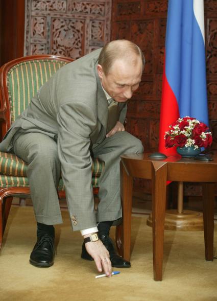 Путин