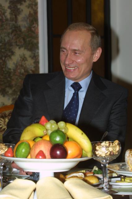 Путин