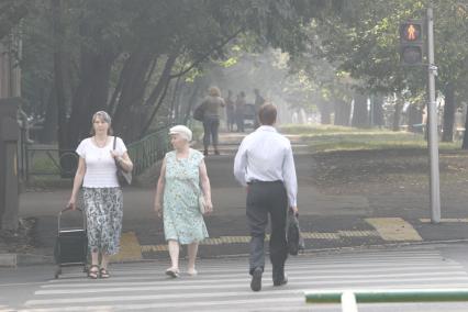 Смог над Москвой, 26 июля 2010 года. С утра в городе чувствуется запах гари и местами стоит густой дым от лесных пожаров Подмосковья.  Жара. Лесные пожары. Глобальное потепление.