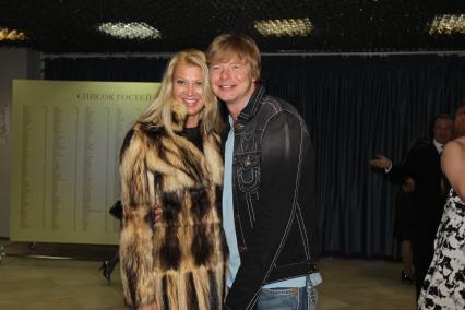 22 января 2011 Андрей Григорьев-Аполлонов с супругой. В банкетном зале Форум-холл.