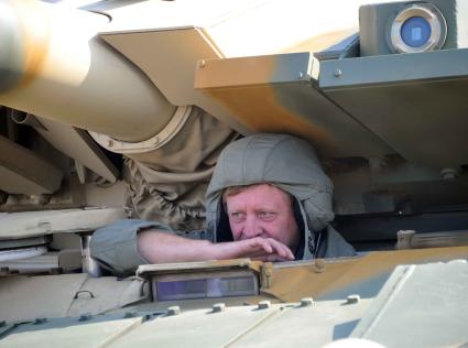 VIII Международная выставка вооружения, военной техники и боеприпасов НИЖНИЙ ТАГИЛ - 2011. На снимке: танкист. 9 сентября 2011 года.