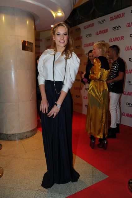 Церемония вручения премии ЖЕНЩИНА ГОДА ЖУРНАЛА GLAMOUR 2011. На снимке: телеведущая Марика (Мария Кравцова). 17 ноября 2011 года.