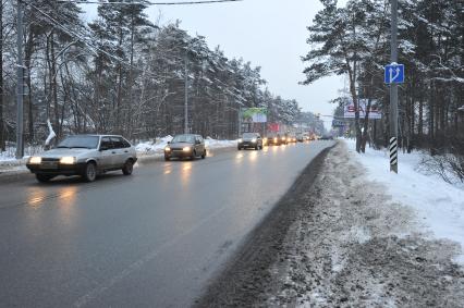 Автомобили движутся по Рублевскому шоссе. 21 января  2011 года.