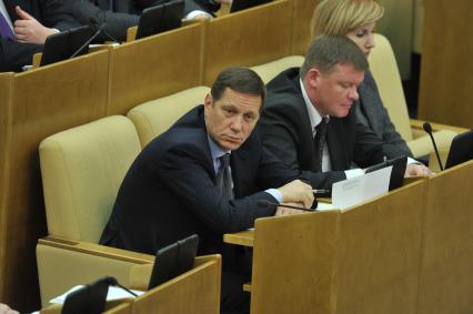 Первое пленарное заседание Госдумы РФ шестого созыва. На снимке: депутат Госдумы РФ Александр Жуков. 21 декабря 2011 года.