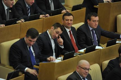 Первое пленарное заседание Госдумы РФ шестого созыва. На снимке: депутат госдумы от ЛДПР Дмитрий Носов. 21 декабря 2011 года.