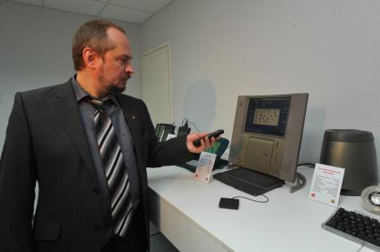 В Москве открылся музей Apple. На снимке: собиратель экспонатов музея Андрей Антонов на выставке.