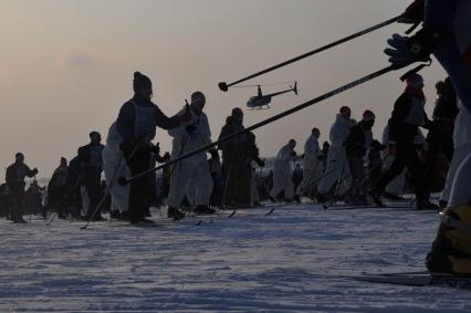 XXX открытая Всероссийская массовая лыжная гонка `Лыжня России -2012`. На снимке: участники соревнования.