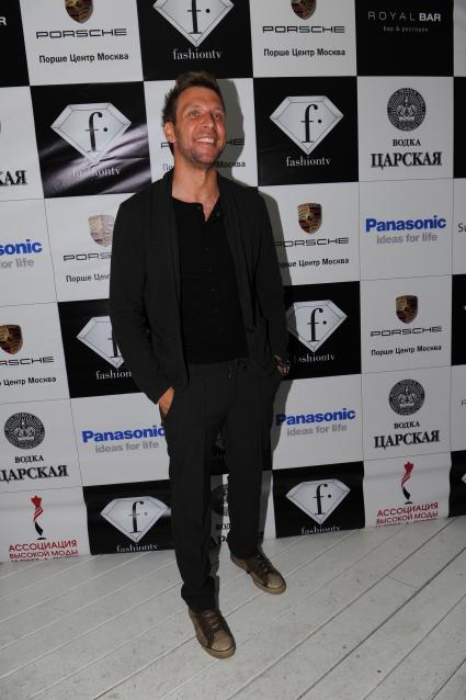 Церемонии вручения премии телеканала Fashion TV `Fashion Summer Awards 2012` в ресторане `Royal Bar`. На снимке: телеведущий Арчи (Артур Цветков).