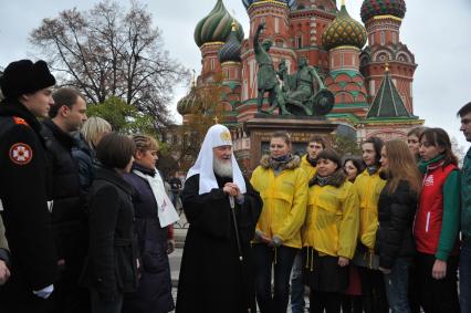 Красная площадь. Церемония возложения цветов к памятнику Кузьме Минину и Дмитрию Пожарскому в День народного единства. На снимке: патриарх Московский и всея Руси Кирилл