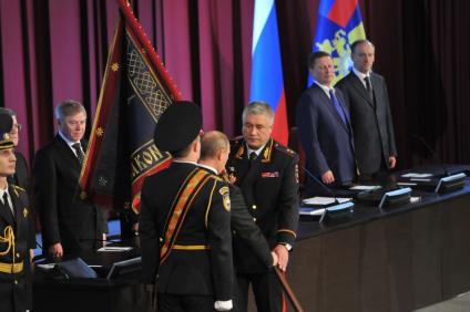 Расширенное заседание коллегии МВД России. На снимке: президент РФ Владимир Путин и министр внутренних дел РФ Владимир Колокольцев (в центре слева направо)