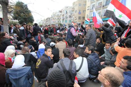 Проправительственный митинг в центре Дамаска.