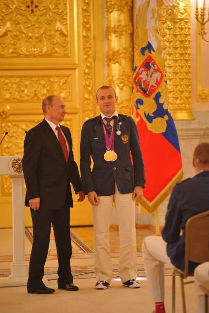 Владимир Путин принял в Кремле членов национальной паралимпийской сборной, победителей и призёров XIV Паралимпийских игр в Лондоне. На снимке: президент России Владимир Путин.