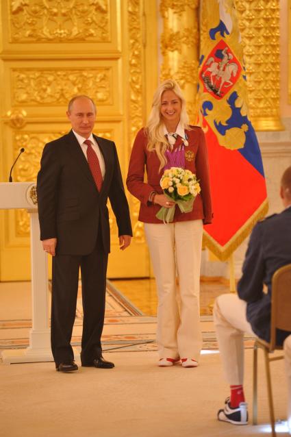 Владимир Путин принял в Кремле членов национальной паралимпийской сборной, победителей и призёров XIV Паралимпийских игр в Лондоне. На снимке: президент России Владимир Путин.