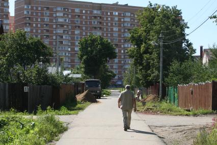 Новая Москва. На снимке: новостройки и дачные участки