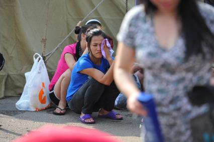 2-ой Иртышский проезд. Палаточный лагерь для временного содержания нелегальных мигрантов, ожидающих депортации на родину.