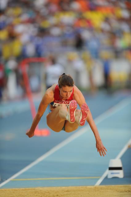 СК \"Лужники\".  Церемония открытия чемпионата мира по легкой атлетике 2013.  Квалификационный раунд по прыжкам в длину. На снимке: российская спортсменка  Елена Соколова