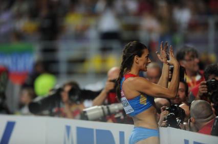 СК `Лужники`. Чемпионат мира по легкой атлетике 2013. Прыжки с шестом среди женщин. На снимке: российская спортсменка Елена Исинбаева