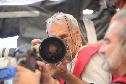 СК `Лужники`. Чемпионат мира по легкой атлетике 2013. На снимке: фотограф Виталий Белоусов