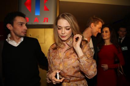 Диск92. Премьера фильма \"Самоубийцы\" 2012 год. На снимке: актеры Акиньшина Оксана (на переднем плане), Воробьев Алексей и певица Дайнеко Виктория