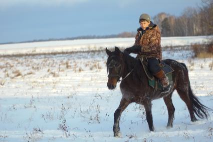 Конеферма агрофирмы `Артемовский`. На снимке: пастух на лошади.