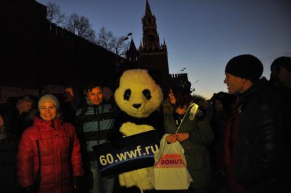 Экологическая акция WWF `Час Земли` в Москве. На снимке: ростовая кукла `Панда`