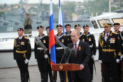 Севастополь. День Победы. На снимке: президент РФ Владимир Путин во время военно-морского парада в бухте Севастополя.