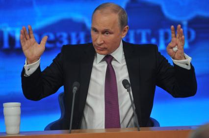 Большая пресс-конференция президента РФ Владимира Путина (на снимке) в Центре международной торговли.