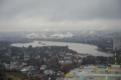 Московская область. Вид на Москву и коттеджный поселок `Мякинино` из кабины вертолета.