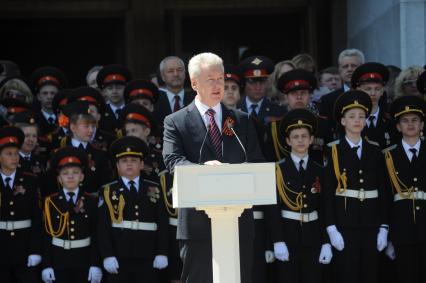 Мэр Москвы Сергей Собянин на параде кадетов `Не прервется связь поколений` на Поклонной горе в Москве.