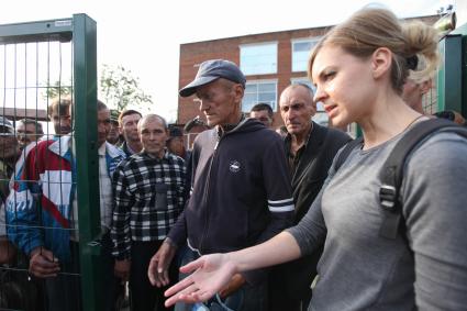 Москва. Бездомные во время раздачи еды в пункте оказания срочной социальной помощи на Краснопрудной улице.