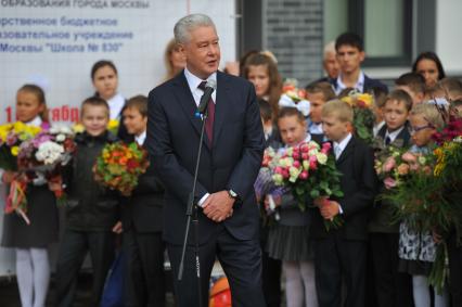 Москва. Мэр Москвы Сергей Собянин открыл новое здание школы # 830 в районе Покровское-Стрешнево, а также поздравил школьников и учителей с Днем знаний.