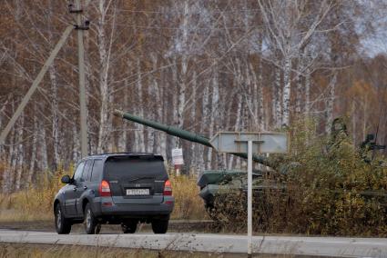 Челябинская область. Чебаркульский военный полигон. БМП-2 в ходе испытания краски с антиобледенительным, маскировочным и радиодезактивирующим свойствами.