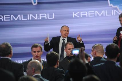 Москва. Президент России Владимир Путин на одиннадцатой большой ежегодной пресс-конференции в Центре международной торговли на Красной Пресне.