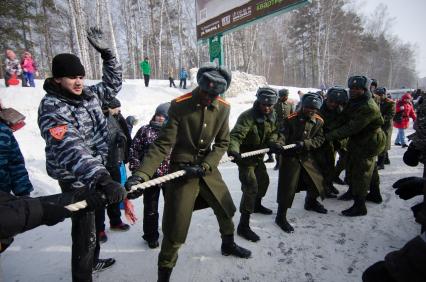 Масленица в Новосибирске. Военные из Конго посетили народные гуляния в Академгородке.