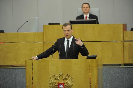 Москва. Председатель правительства РФ Дмитрий Медведев во время выступления на пленарном заседании Государственной думы РФ.