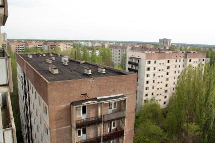 Украина. Зона отчуждения, город Припять, вид из окна высотки на улице Героев Сталинграда