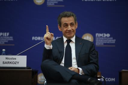 Санкт-Петербург. Экс-президент Франции Николя Саркози (слева) на XX Петербургском международном экономическом форуме.