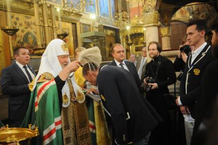 Москва.  Патриарх Московский и всея Руси Кирилл   во время молебна  в Успенском соборе Кремля  перед отъездом  спортсменов на ХХХI летние Олимпийские игры в Рио-де-Жанейро.