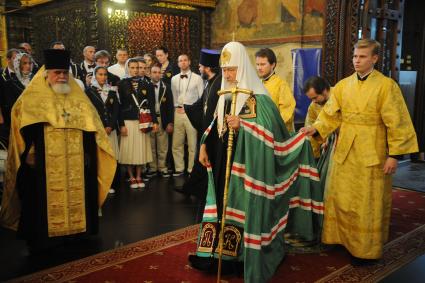 Москва.  Патриарх Московский и всея Руси Кирилл   во время молебна  в Успенском соборе Кремля  перед отъездом  спортсменов на ХХХI летние Олимпийские игры в Рио-де-Жанейро.