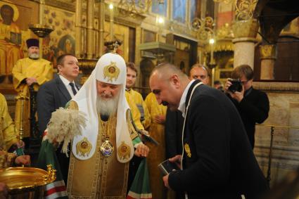 Москва.  Патриарх Московский и всея Руси Кирилл   во время молебна  в Успенском соборе Кремля  перед отъездом  спортсменов на ХХХI летние Олимпийские игры в Рио-де-Жанейро.