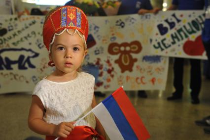 Москва. Участница церемонии встречи `золотого рейса` с чемпионами и призерами ХХХI Олимпийских игр Рио-2016 в аэропорту `Шереметьево`.
