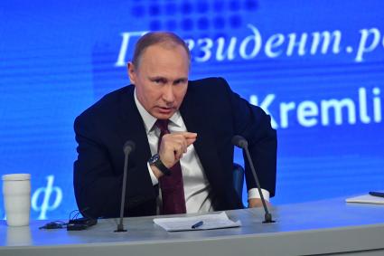 Москва. Президент России Владимир Путин на большой ежегодной пресс-конференции в Центре международной торговли на Красной Пресне.