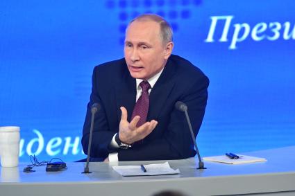 Москва. Президент России Владимир Путин на большой ежегодной пресс-конференции в Центре международной торговли на Красной Пресне.