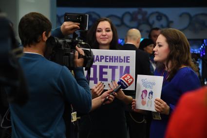 Москва. Журналисты перед началом большой ежегодной пресс-конференции президента России Владимира Путина в Центре международной торговли на Красной Пресне.