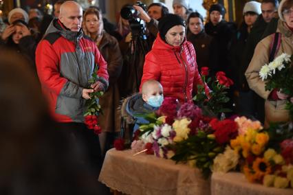 Москва. На церемонии прощания с директором Международной общественной организации `Справедливая помощь` Елизаветой Глинкой, погибшей при крушении самолета Ту-154  над Черным морем 25 декабря 2016-го года, в Успенском соборе Новодевичьего монастыря.