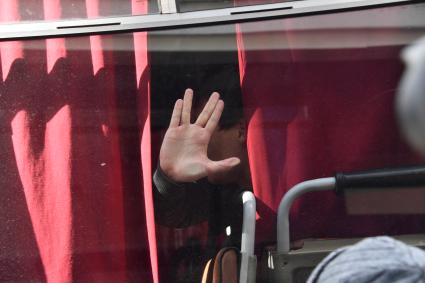 Москва. Задержанный участник несанкционированной акции оппозиции против коррупции на Тверской улице.