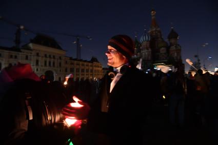 Москва . Участники  экологической акции `Час земли` на Красной площади.