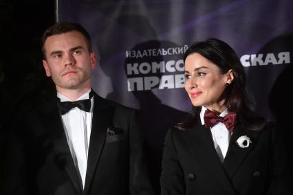 Москва. Вратарь сборной России по футболу и ПФК ЦСКА Игорь Акинфеев, ставший лауреатом премии `Футбольный джентльмен года` имени Федора Черенкова и генеральный продюсер телеканала `Матч ТВ` Тина Канделаки на церемонии вручения приза в ресторане `Нани`.