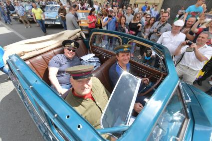 Москва. Участник   ГУМ-авторалли Gorkyclassic-2017   перед стартом гонки.