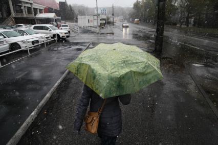 Ставрополь.   Женщина под дождем .